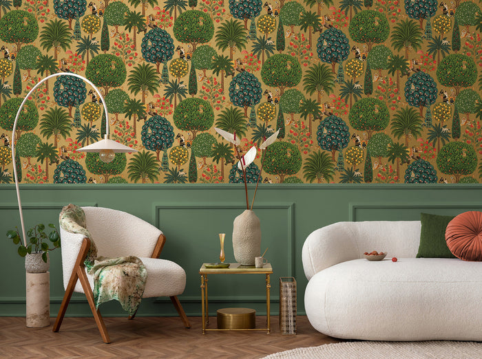Bengal wallpaper in Antique Gold on a feature wall, jewelled animal motifs among leaves