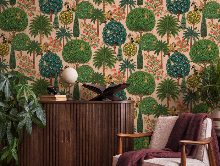 Bengal wallpaper in Blush on a feature wall, jewelled animal motifs among leaves
