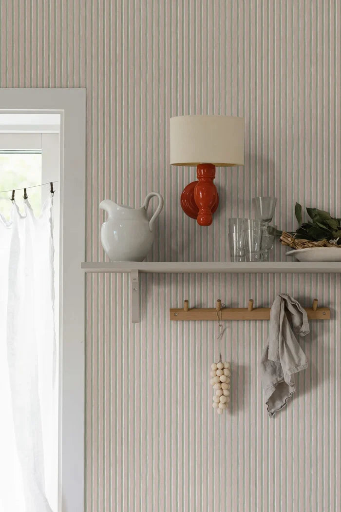 Brita Stripe Wallpaper - Pink in a styled room