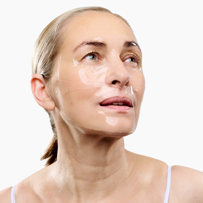 Woman wearing the CurrentBody Skin Hydrogel Face Mask