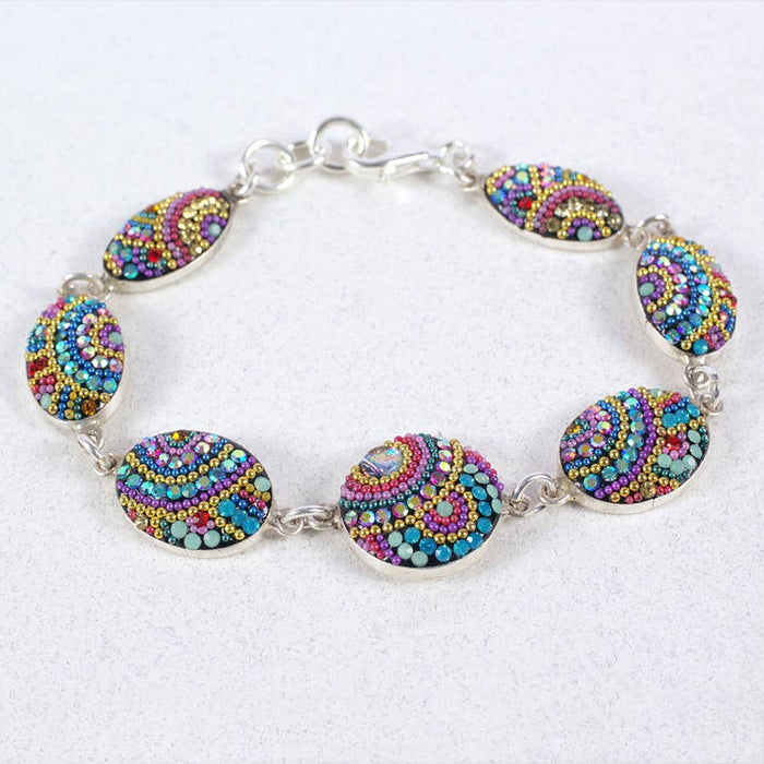 Colorful Edgeless Bracelet by Mosaico Jewels showcasing intricate beadwork in vibrant hues, perfect for mixing and matching with other jewelry.