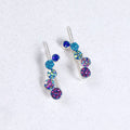 Vibrant Falling Circles Earrings by Mosaico Jewels, featuring blue and purple sparkly elements on a silver base.
