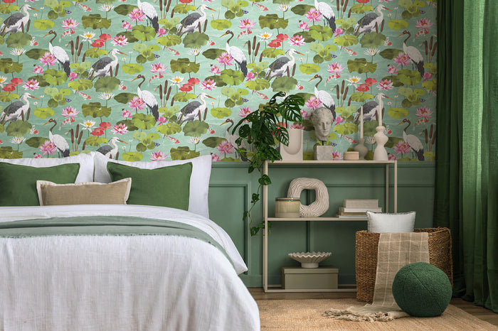 Hermine wallpaper in Light Teal on a feature wall, koi pond scene with cranes and lily pads