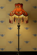 Orange Victorian lampshade with bee motifs and Hewson Bee Sunshine Brick wallpaper
