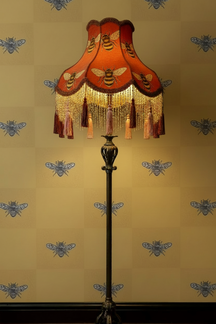 Orange Victorian lampshade with bee motifs and Hewson Bee Sunshine Brick wallpaper