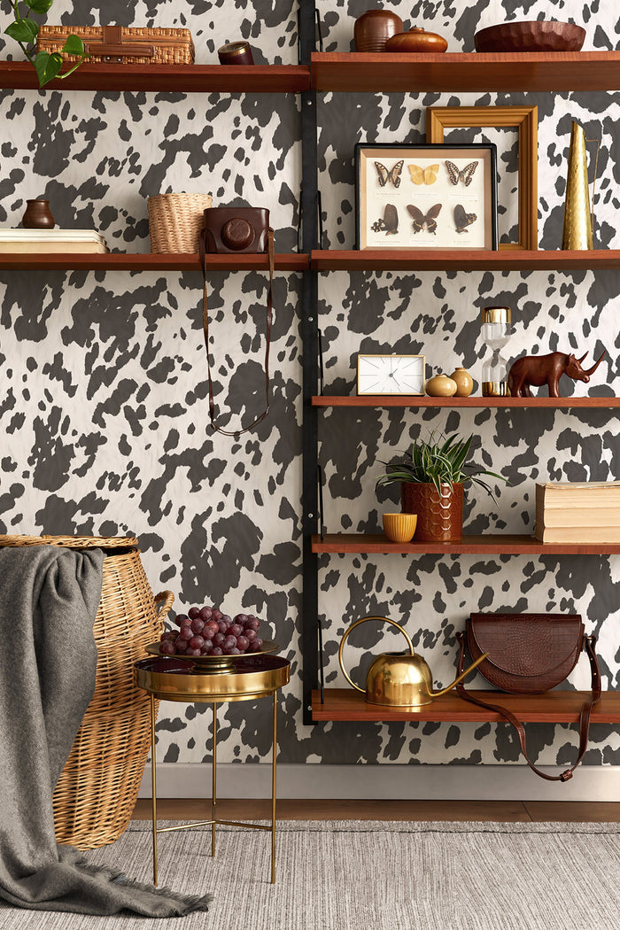 Holstein wallpaper in Black and White on a feature wall, cowhide-pattern detail