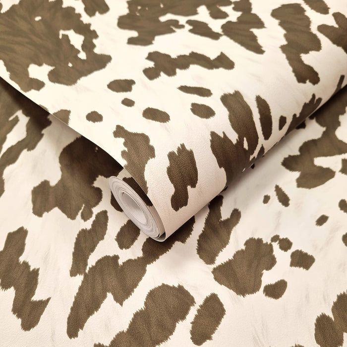 Holstein Cocoa wallpaper roll showing the cowhide-pattern repeat