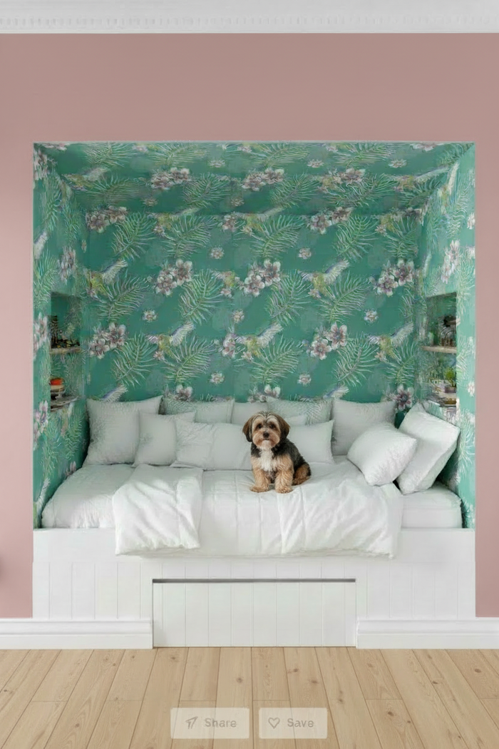 Bedroom nook with Kakariki Parrots turquoise wallpaper, white cushions, and tan and black Shih Poo dog