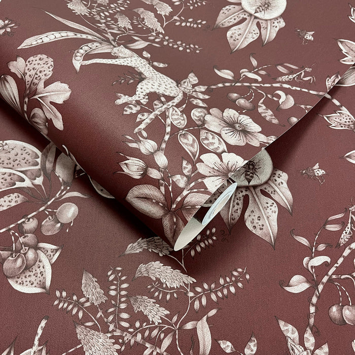 Liana Maroon wallpaper roll showing the tonal leopard and pomegranate repeat