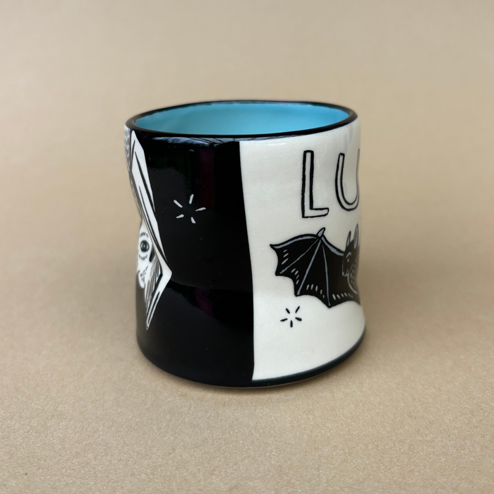 Lucky Bat Cup - Medium by The Bowl Maker highlighting intricate illustrations of bats and unique art style, crafted for comfortable use.