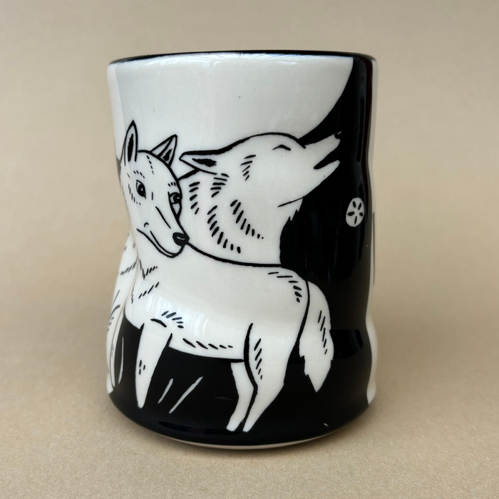 Lucky Wolf Cup - XLarge showcasing a black and white design of wolves howling and sitting, made by The Bowl Maker.