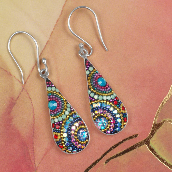 Colorful Morning Drop Earrings by Mosaico Jewels displayed against a soft, pastel background, showcasing intricate beading and design.