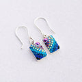 Petite Crystal Spark Earrings from Mosaico Jewels featuring a vibrant mix of blue crystals on a lightweight design.