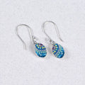 Petite Oval Earring by Mosaico Jewels featuring a shimmering blue design with sparkly accents, ideal for adding elegance to any outfit.