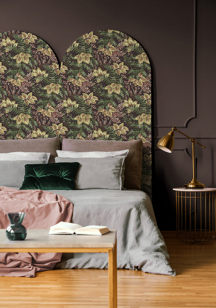 Rowan wallpaper in Charcoal on a feature wall, dense hand-painted foliage