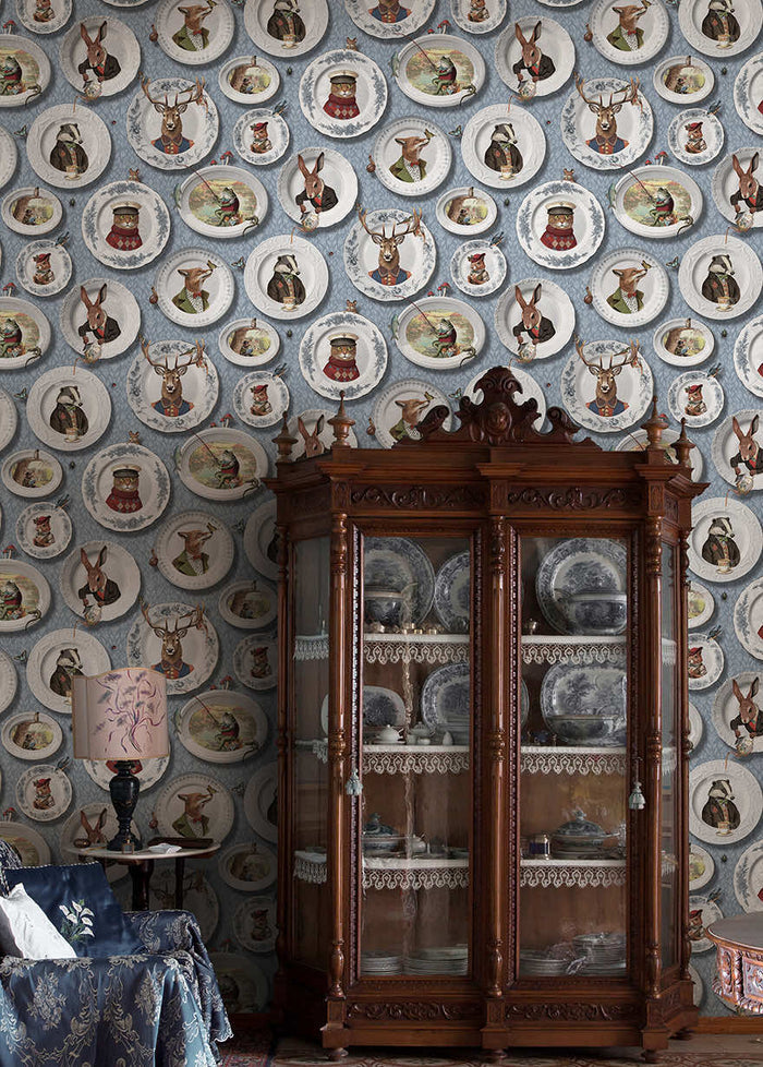 Blue Tales of the Manor animal plate wallpaper on a child's bedroom wall